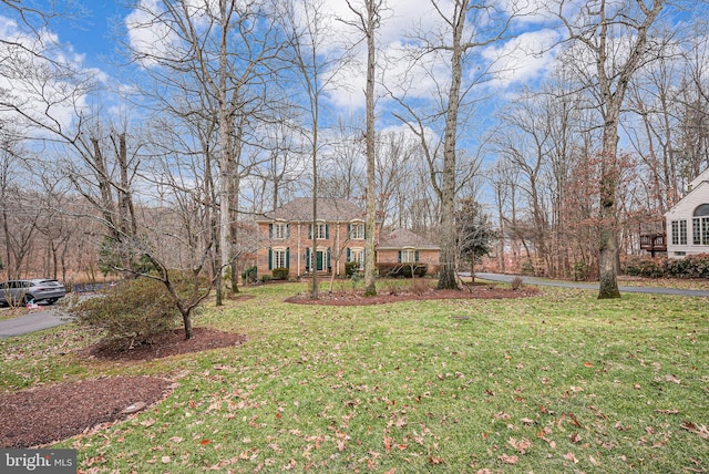 view of front of home with a front yard