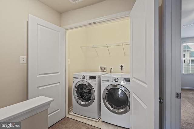 laundry area featuring laundry area, carpet floors, and washer and dryer