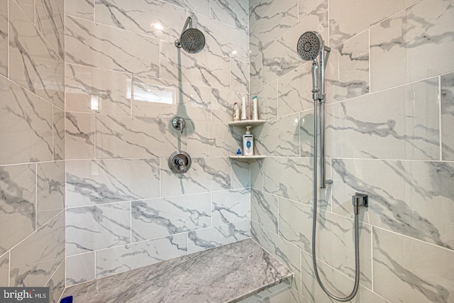 bathroom featuring tiled shower