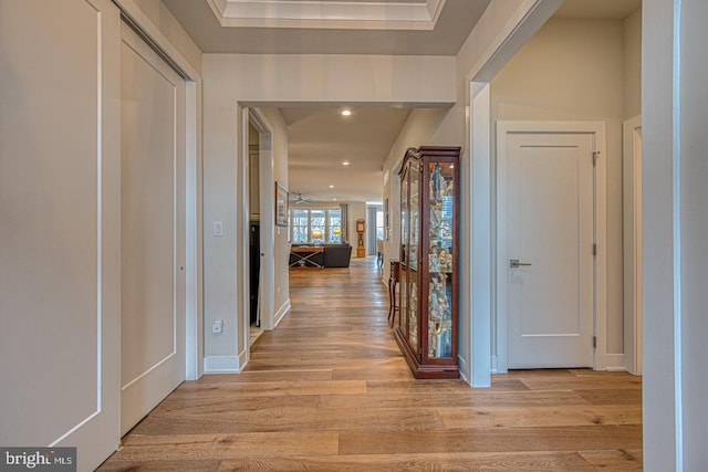 hallway with light wood-type flooring