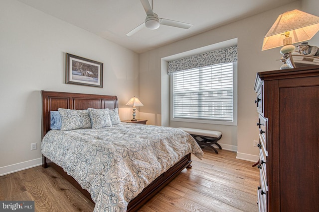 bedroom featuring ceiling fan and light hardwood / wood-style floors