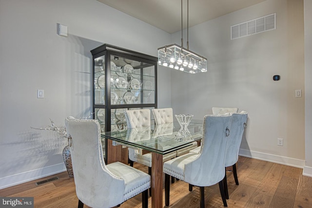 dining area featuring hardwood / wood-style flooring