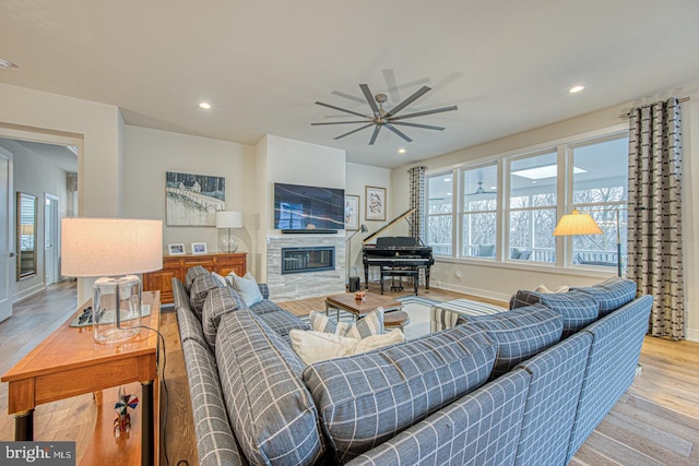 living room with light hardwood / wood-style flooring