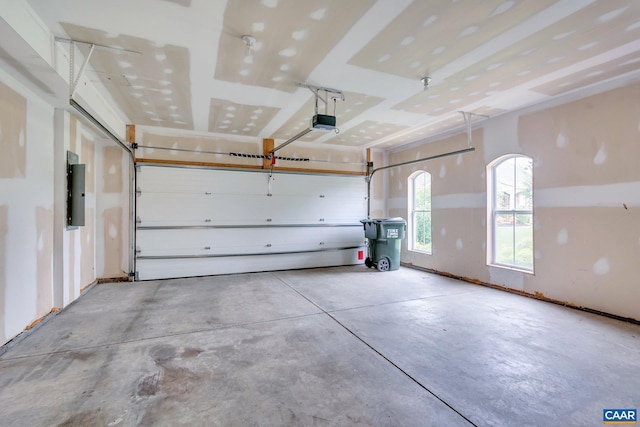 1305 Gate Post Ln, Charlottesville, VA 22901 - garage featuring a garage door opener and electric panel