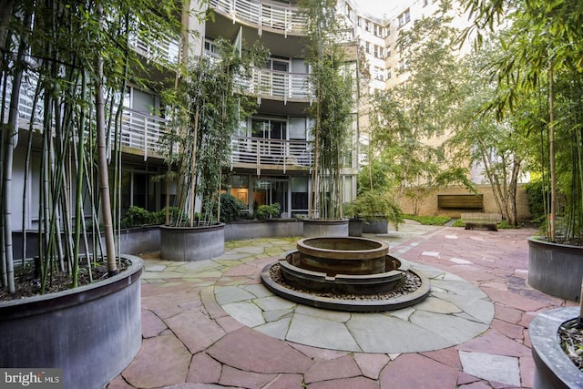 view of home's community featuring a patio area