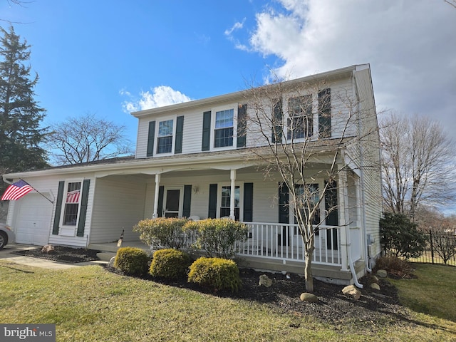 view of front of home featuring a porch and a front lawn