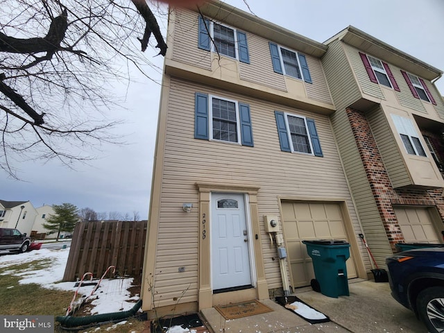 view of property featuring a garage