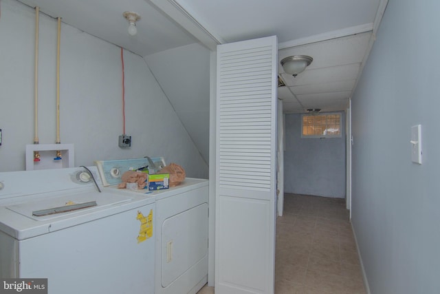 washroom featuring washer and clothes dryer