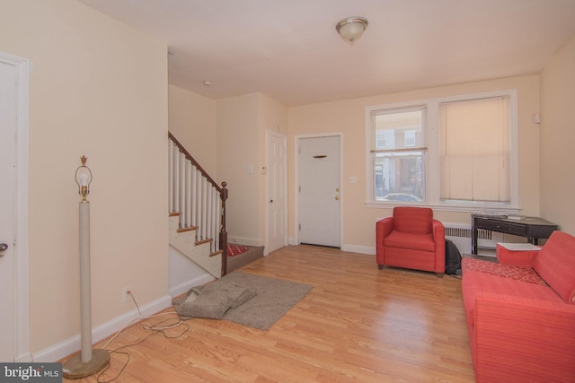 foyer entrance with light wood-type flooring