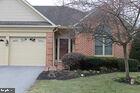 view of front of house featuring a garage and a front yard