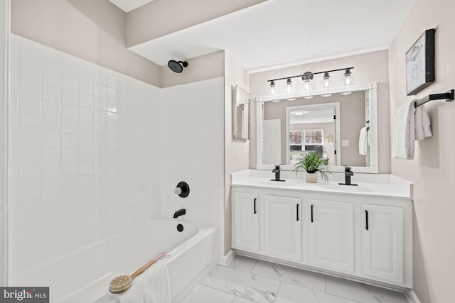 bathroom with shower / bathing tub combination and vanity