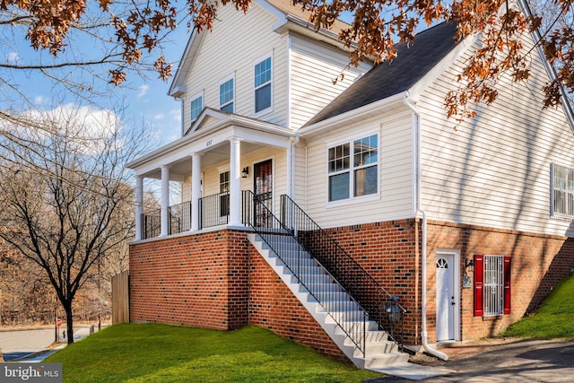 view of property with a front lawn