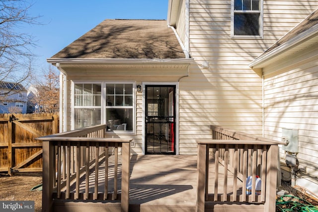 doorway to property featuring a wooden deck