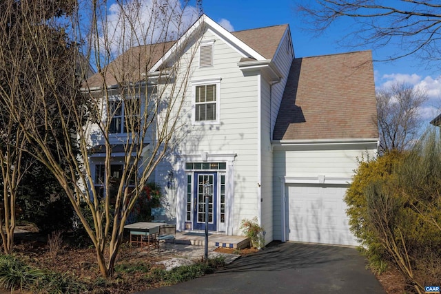 front facade with a garage