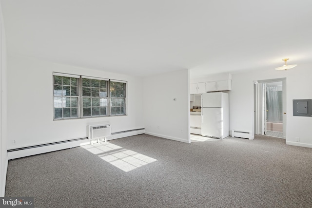 unfurnished room featuring a baseboard heating unit, carpet flooring, and electric panel