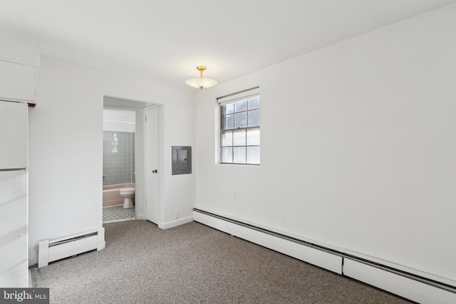 unfurnished room featuring electric panel, baseboards, baseboard heating, and carpet flooring