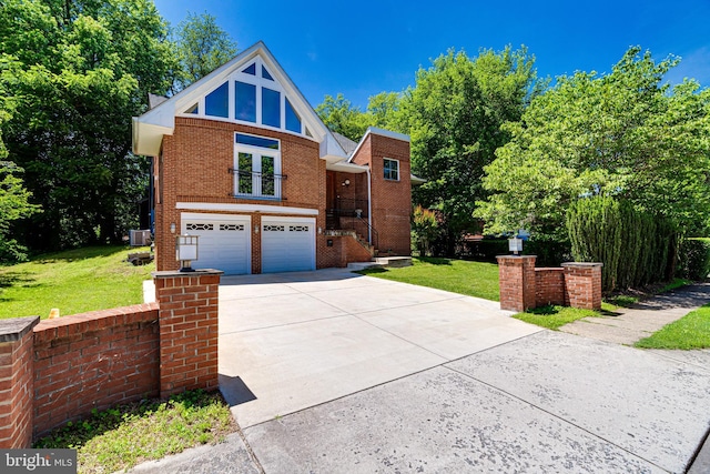 view of front of home featuring driveway, brick siding, an attached garage, cooling unit, and a front yard