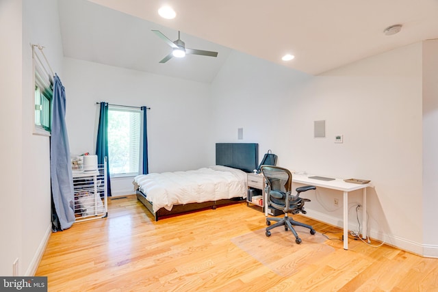 bedroom featuring lofted ceiling, recessed lighting, a ceiling fan, baseboards, and light wood finished floors