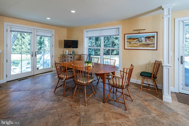 dining space featuring recessed lighting, visible vents, baseboards, french doors, and decorative columns