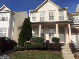 multi unit property featuring a porch