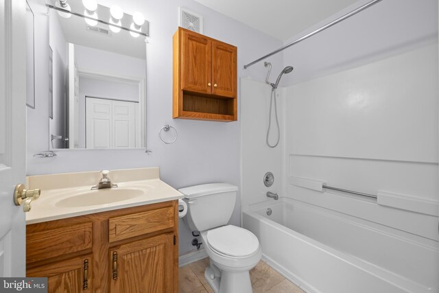 bathroom with toilet, vanity, washtub / shower combination, and visible vents