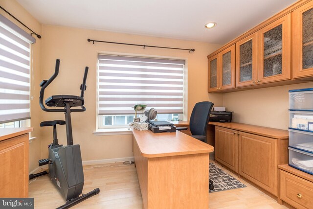 office area with light hardwood / wood-style flooring