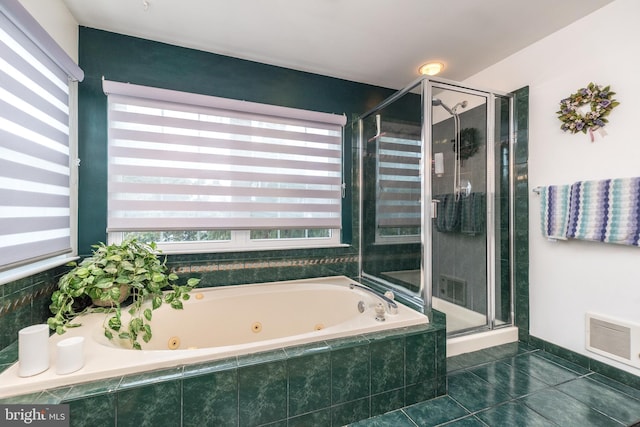 bathroom featuring independent shower and bath and tile patterned floors