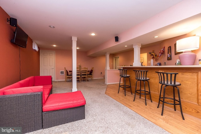 interior space with hardwood / wood-style flooring