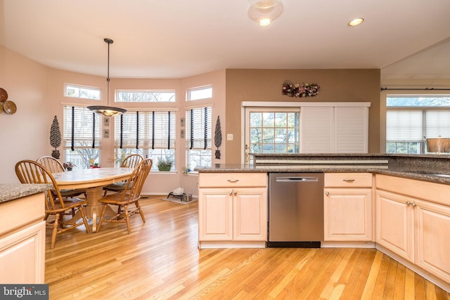 kitchen with dishwasher, pendant lighting, and light wood-type flooring