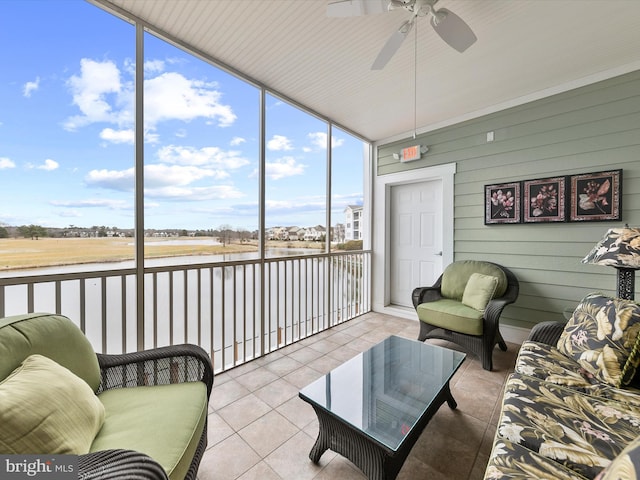 sunroom / solarium with ceiling fan