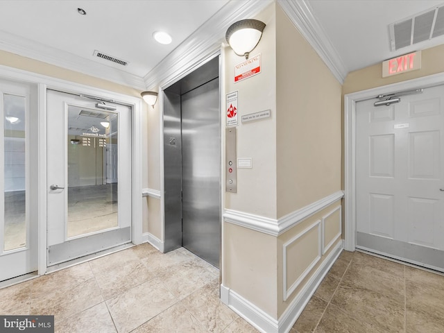 corridor with crown molding, elevator, and light tile patterned floors