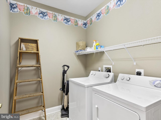 laundry area featuring washing machine and dryer