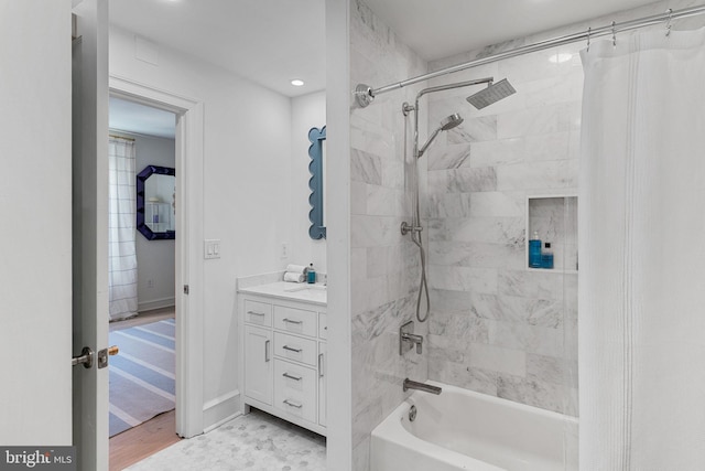 full bath featuring shower / tub combo and vanity