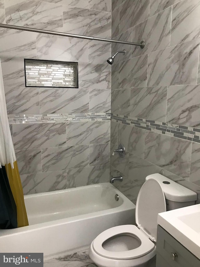 full bathroom with vanity, shower / bath combination with curtain, and toilet