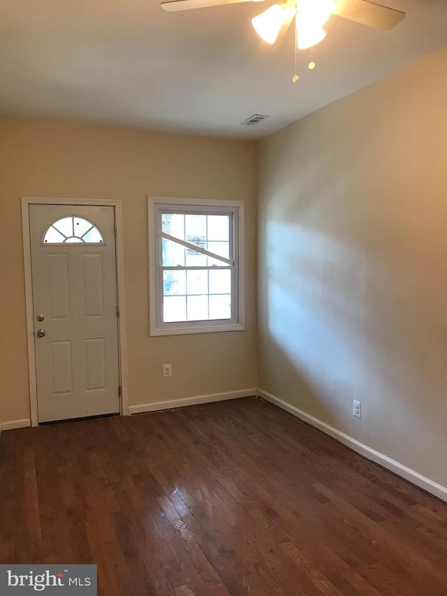 entrance foyer featuring dark hardwood / wood-style floors and ceiling fan