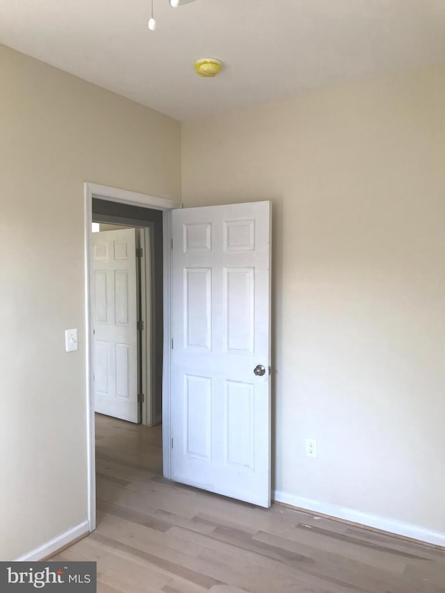 unfurnished bedroom featuring light hardwood / wood-style floors