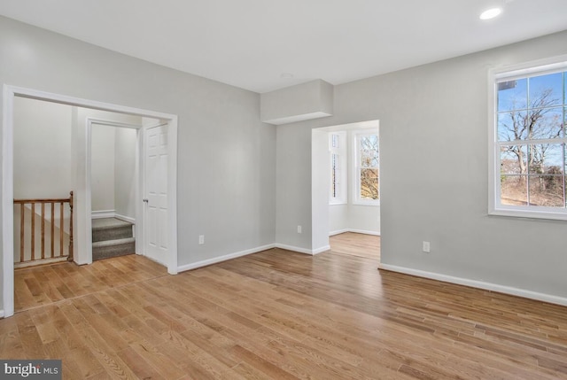 unfurnished bedroom featuring light wood-type flooring