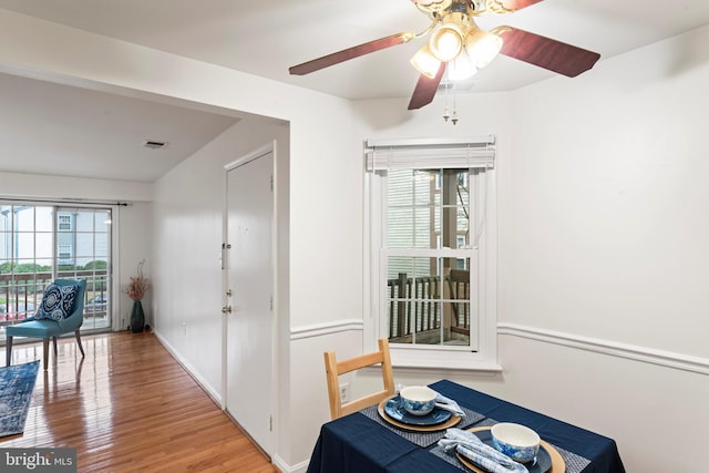 6913 Victoria, Alexandria, VA 22310 - dining area with light wood-type flooring, a wealth of natural light, a ceiling fan, and visible vents