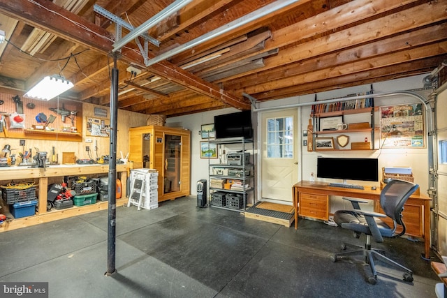 basement with a workshop area