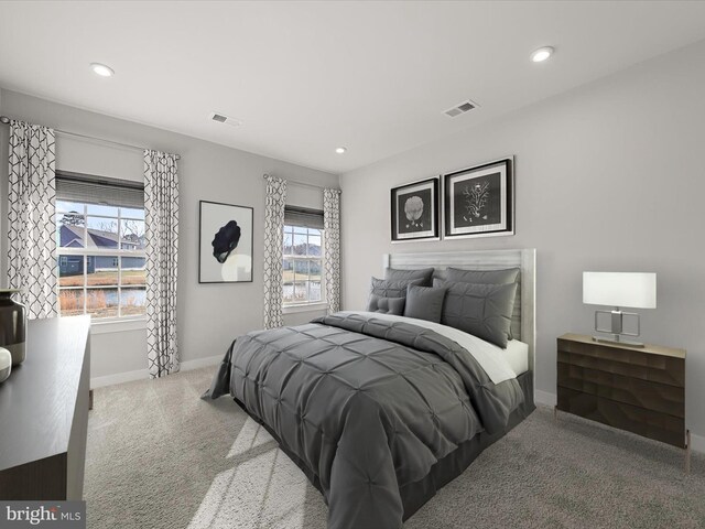 bedroom featuring light carpet