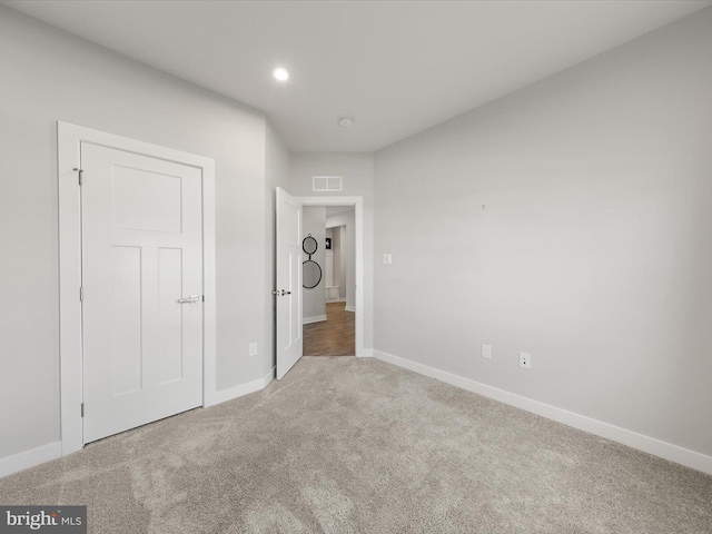 unfurnished bedroom featuring carpet floors