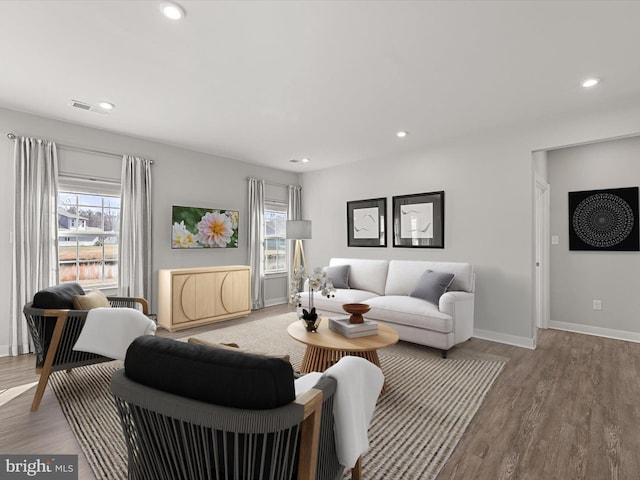 living room with light hardwood / wood-style floors