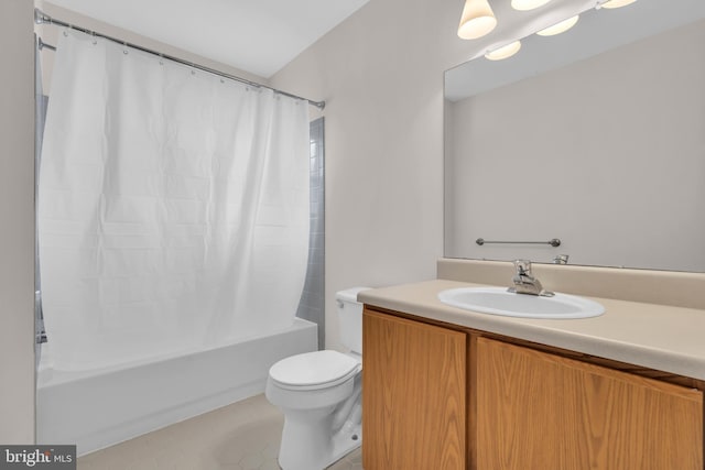 full bathroom with tile patterned floors, vanity, toilet, and shower / bath combo