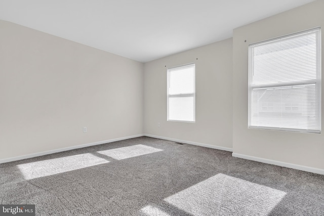 view of carpeted spare room