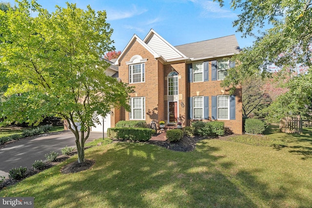 view of front of property with a front lawn