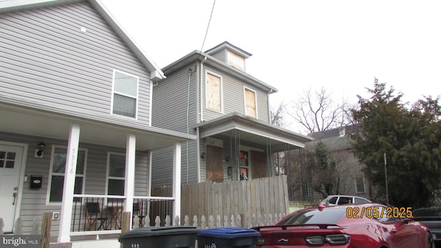 view of front of property featuring covered porch