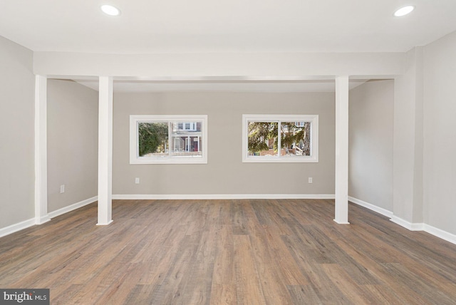 basement featuring dark hardwood / wood-style flooring