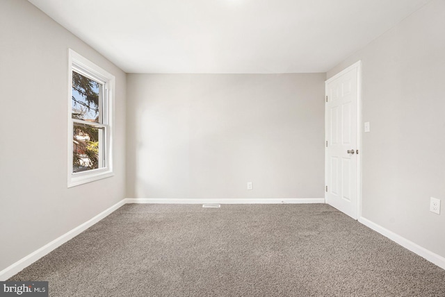 view of carpeted spare room