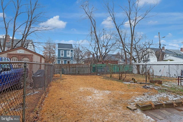 view of yard with an outbuilding and a garage