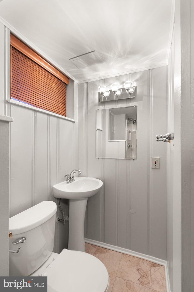 bathroom with a sink and toilet